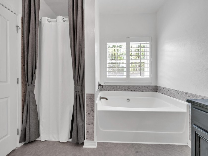 214 Whispering Lake is a beautifully maintained 3 bedroom 2.5 - photo 25