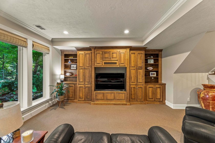 Nestled at the end of a quiet, tree-lined cul-de-sac, this - photo 40
