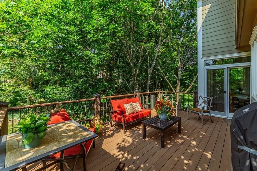 Nestled at the end of a quiet, tree-lined cul-de-sac, this - photo 49