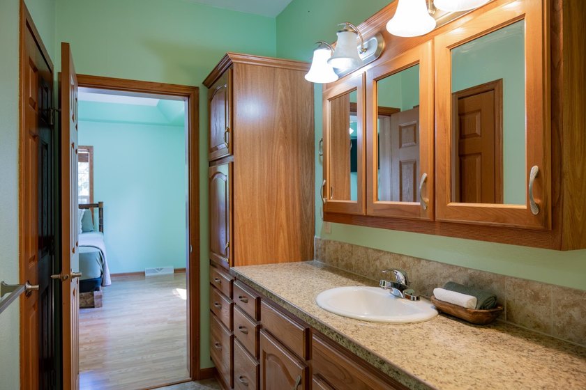 Built in 2014 and situated on a secluded 0.94-acre lot, this - photo 22