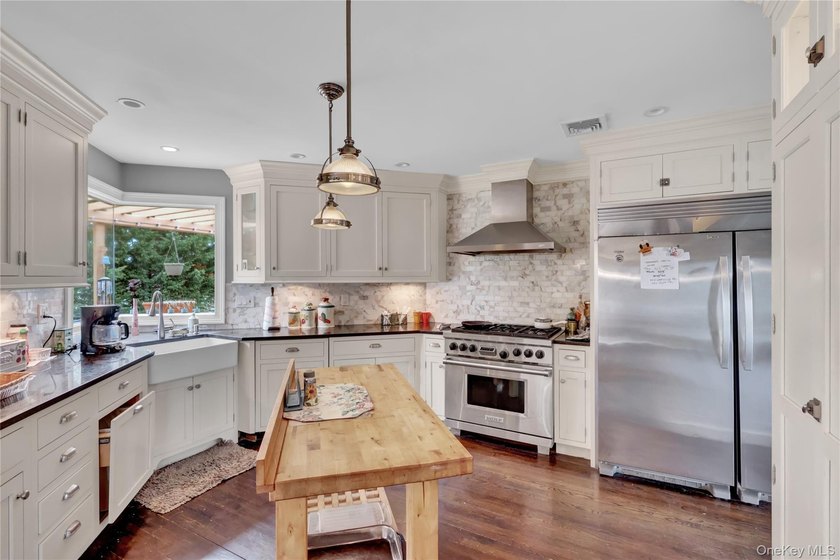 This unique home located in Bar Harbor boasts an open floor plan - photo 26