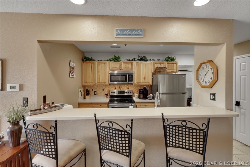 Top-floor, two-story lakefront living in the heart of Osage - photo 11