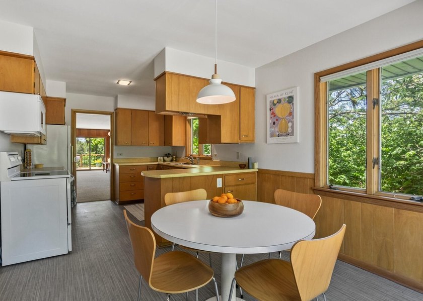 Mid Century sprawling home offers so many spaces to entertain - photo 7