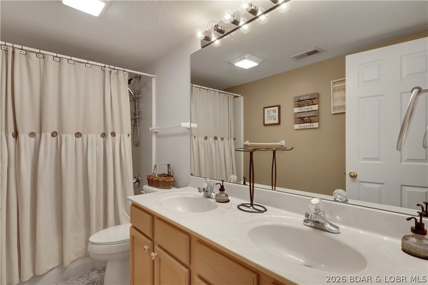 Top-floor, two-story lakefront living in the heart of Osage - photo 19