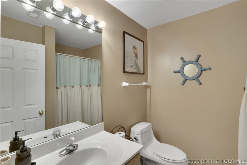 Top-floor, two-story lakefront living in the heart of Osage - photo 22