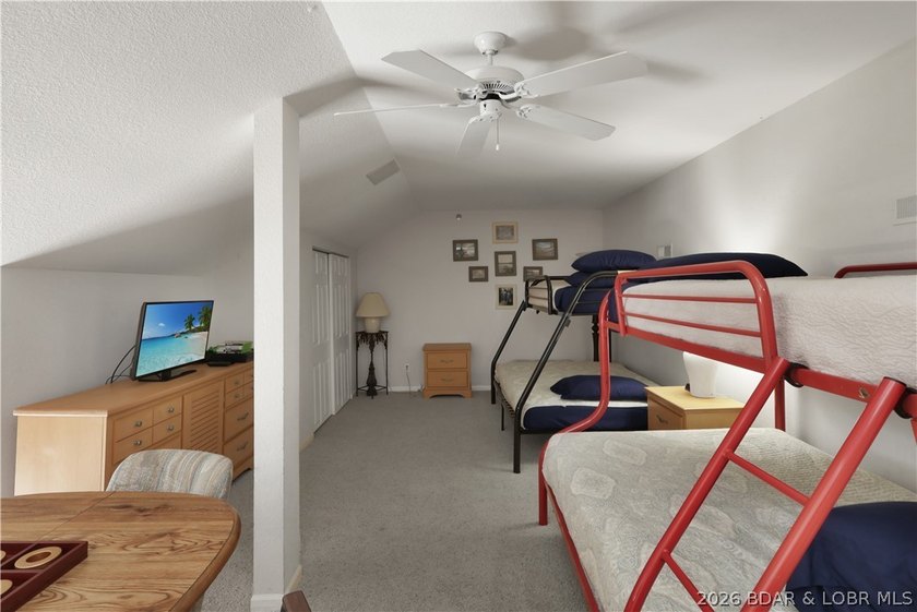 Top-floor, two-story lakefront living in the heart of Osage - photo 25