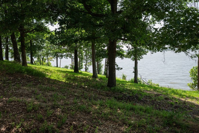 Waterfront on the main lake, across from Duck Creek, 2 boat - photo 2