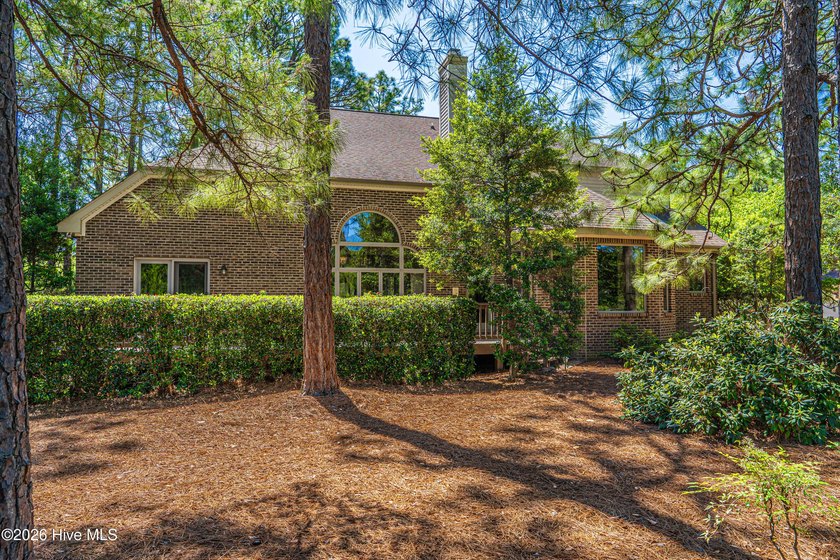 Located in the Pinehurst No. 6 neighborhood, this custom-built - photo 50
