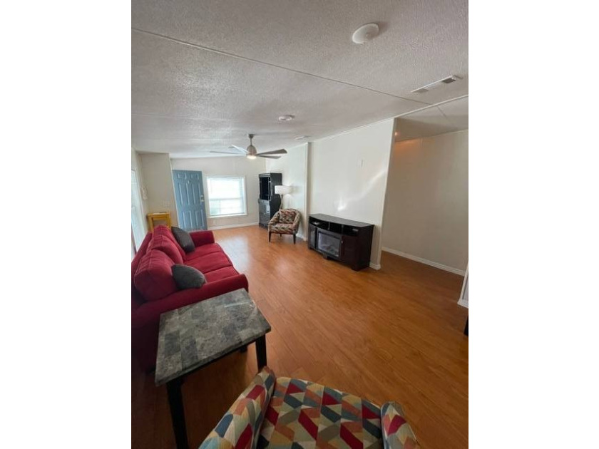 Welcome home to this beautifully updated residence in the - photo 3