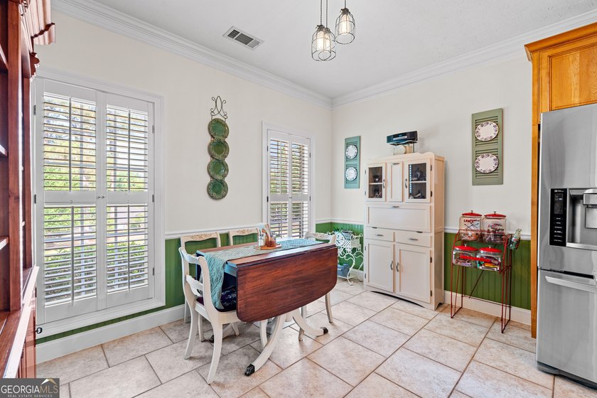 This stunning 4 bedroom, 4 bath home is packed is located in - photo 11