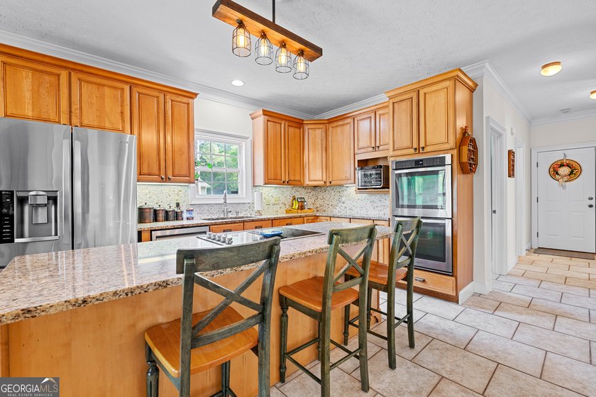 This stunning 4 bedroom, 4 bath home is packed is located in - photo 17