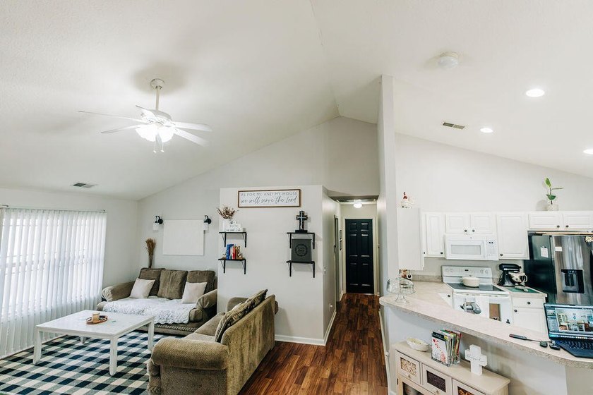Welcome to this charming 3-bedroom, 2-bathroom home featuring a - photo 37