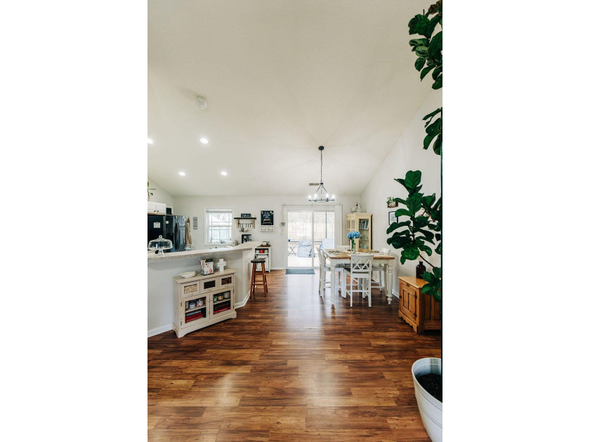 Welcome to this charming 3-bedroom, 2-bathroom home featuring a - photo 38
