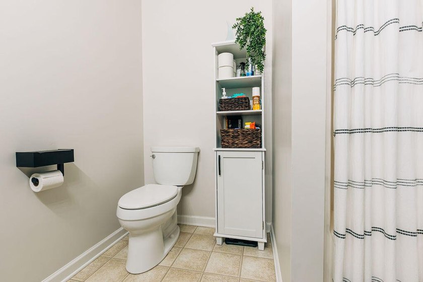 Welcome to this charming 3-bedroom, 2-bathroom home featuring a - photo 46