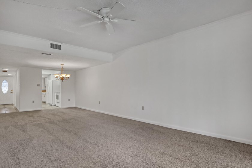 Step into this inviting two-bedroom, two-bathroom condo, where - photo 9