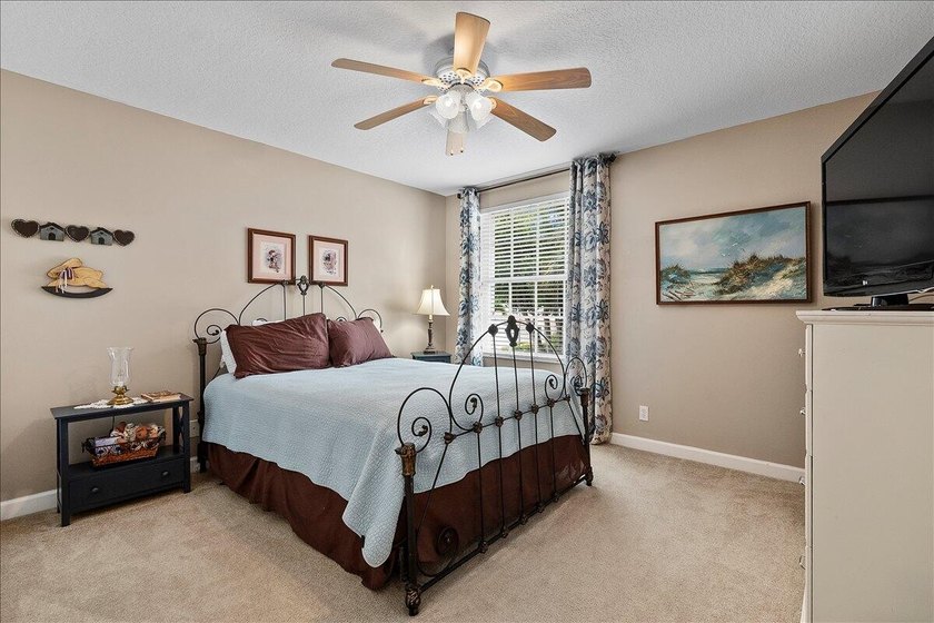 Welcome home to this beautifully maintained two-story lakefront - photo 23