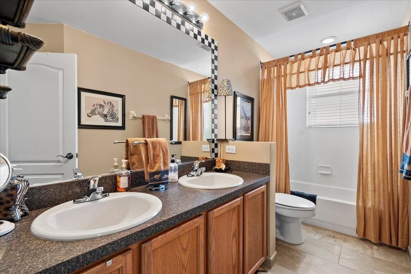 Welcome home to this beautifully maintained two-story lakefront - photo 24