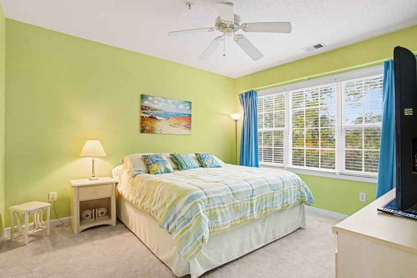 Welcome to this bright and beachy 2-bedroom, 2-bath end-unit - photo 14