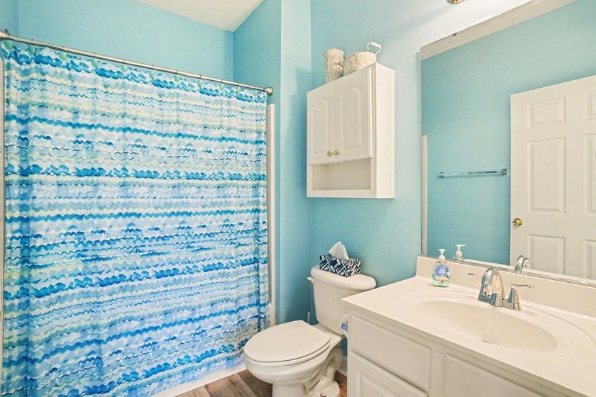 Welcome to this bright and beachy 2-bedroom, 2-bath end-unit - photo 16