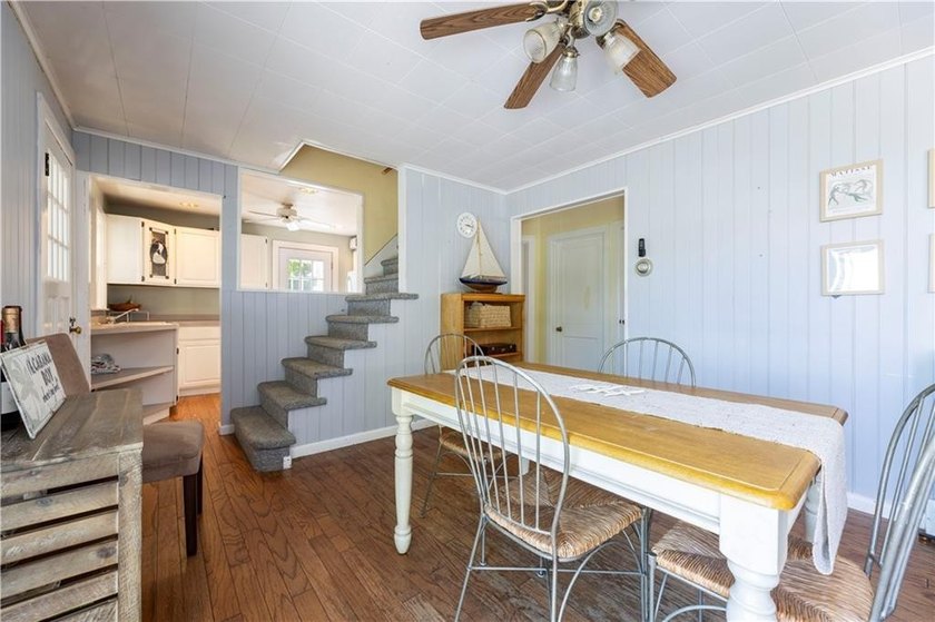 Nestled on desirable Harbour Island, this charming shingle-style - photo 14