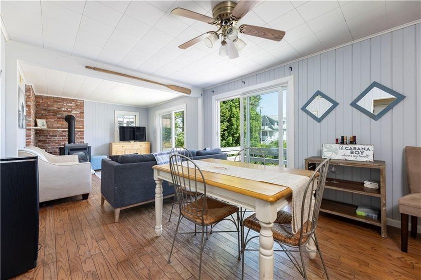 Nestled on desirable Harbour Island, this charming shingle-style - photo 15