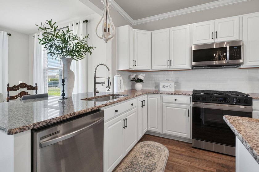 Welcome to this beautifully upgraded home located in one of the - photo 24