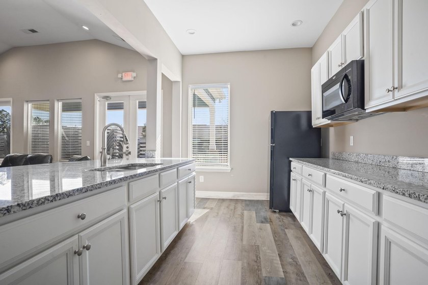 Welcome to this beautifully upgraded home located in one of the - photo 47