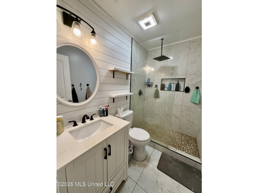 Welcome to Eastlawn! This updated 3-bedroom, 2-bath home sits on - photo 14
