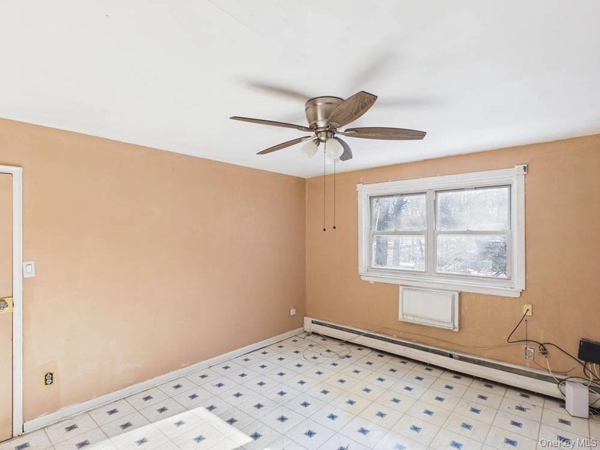 Semi-detached two-family home located in the Allerton section of - photo 15
