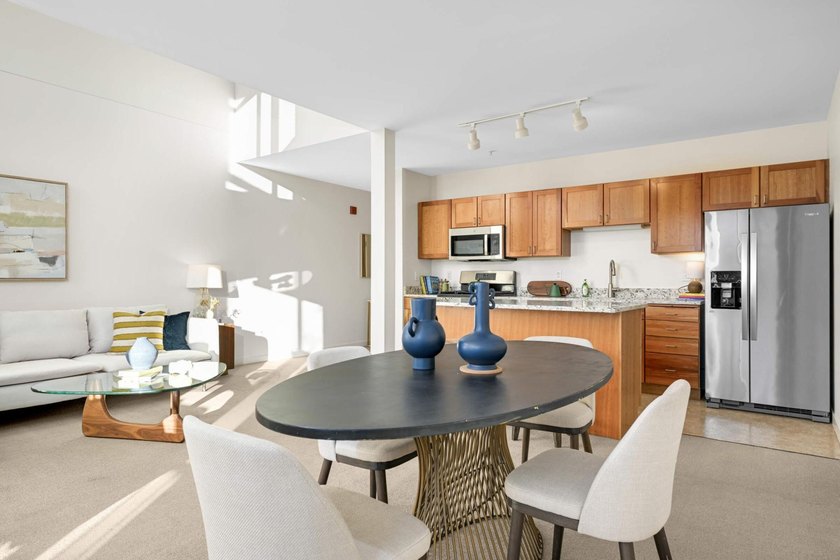 This stylish two story loft offers modern living with all the - photo 12