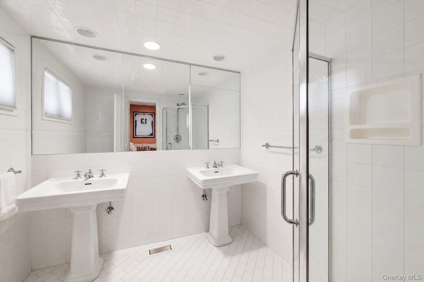 Welcome to this exceptional Hewlett residence, where timeless - photo 20