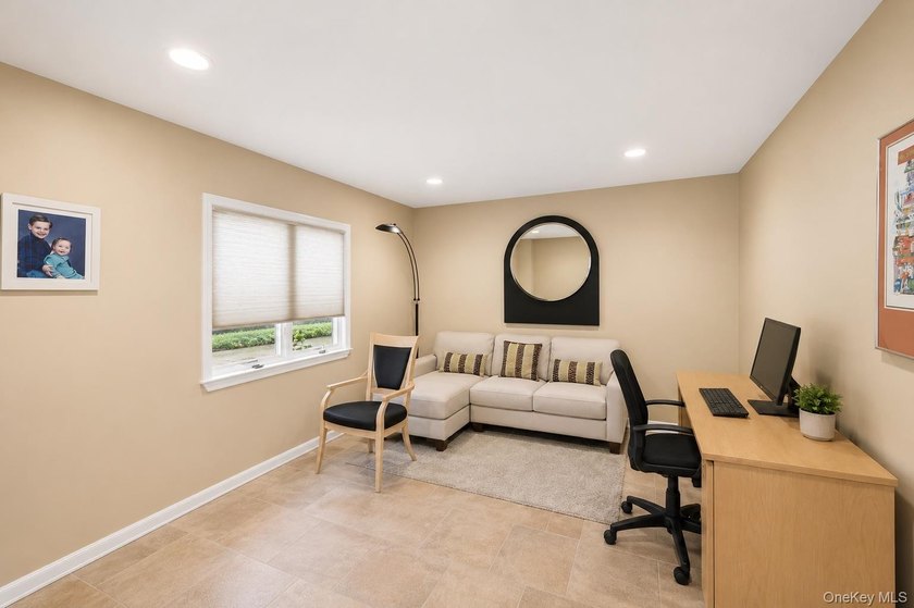 Welcome to this exceptional Hewlett residence, where timeless - photo 21