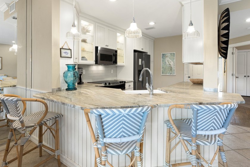 This highly sought-after condominium offers the perfect blend of - photo 13