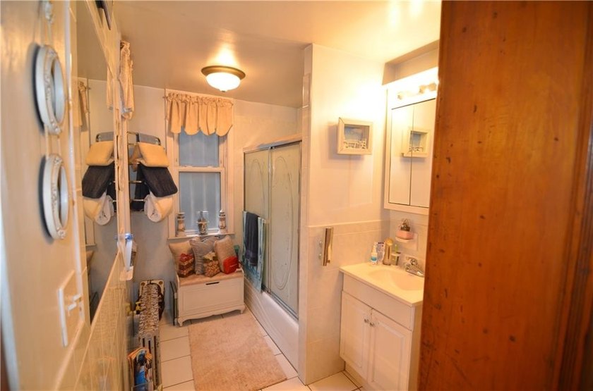 Welcome to this charming three-family brownstone, ideally - photo 19