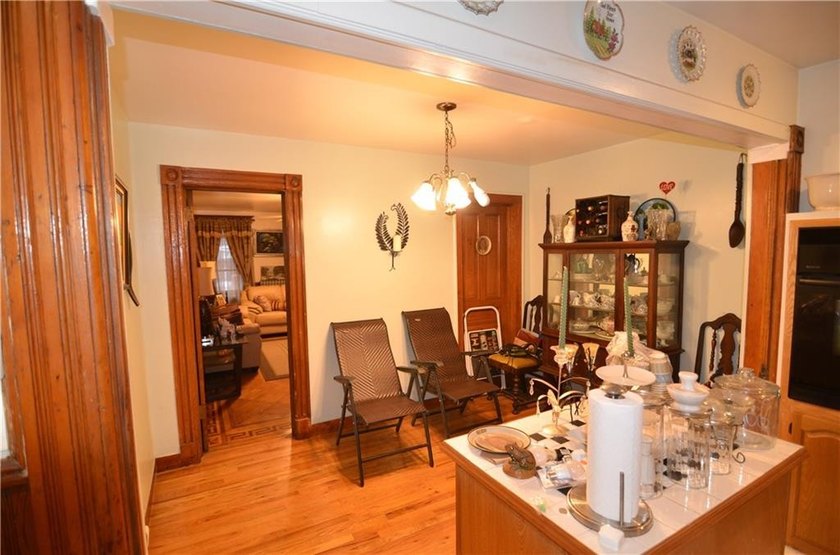 Welcome to this charming three-family brownstone, ideally - photo 24