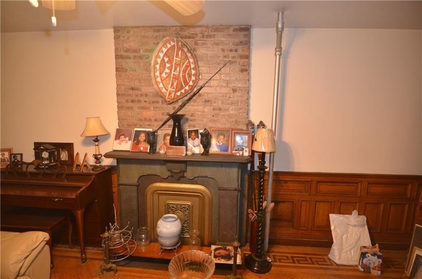 Welcome to this charming three-family brownstone, ideally - photo 28