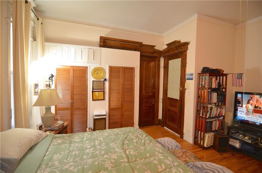 Welcome to this charming three-family brownstone, ideally - photo 29