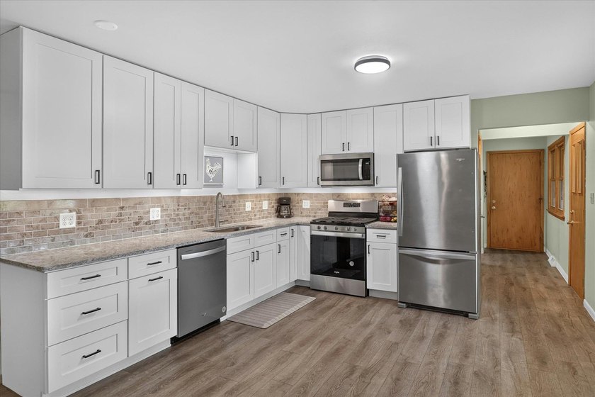 Beautifully remodeled all-brick ranch on a sprawling 2.2-acre - photo 12