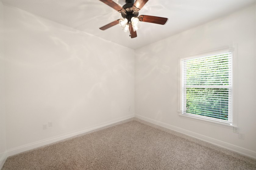 Set on a huge 0.52 acre lot with peaceful forest views, this - photo 34