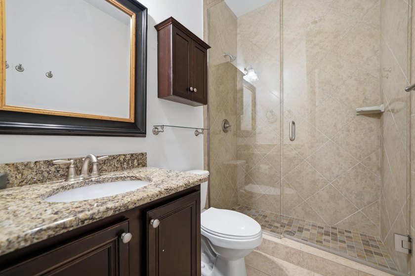 Set on a huge 0.52 acre lot with peaceful forest views, this - photo 38