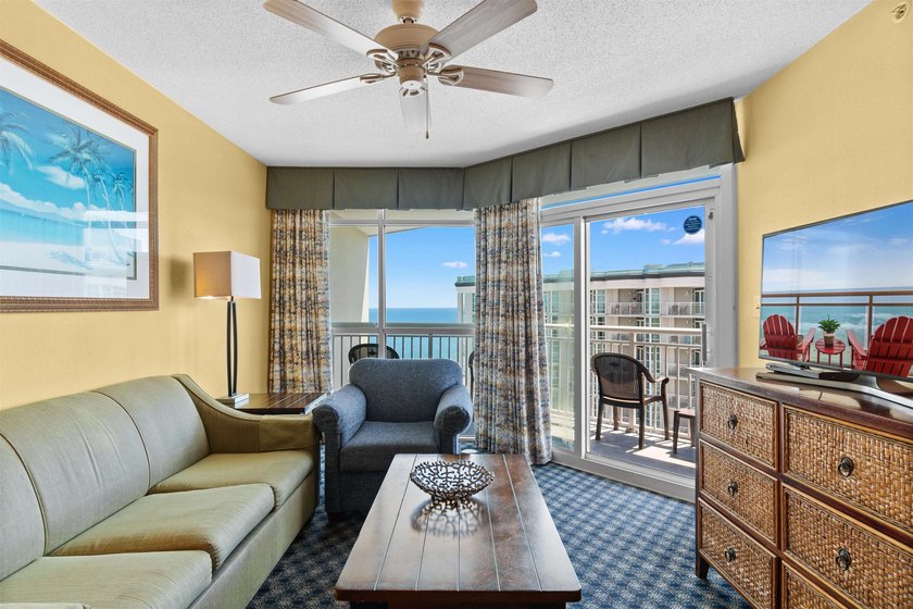 This beautifully furnished three bedroom Penthouse level unit at - photo 11