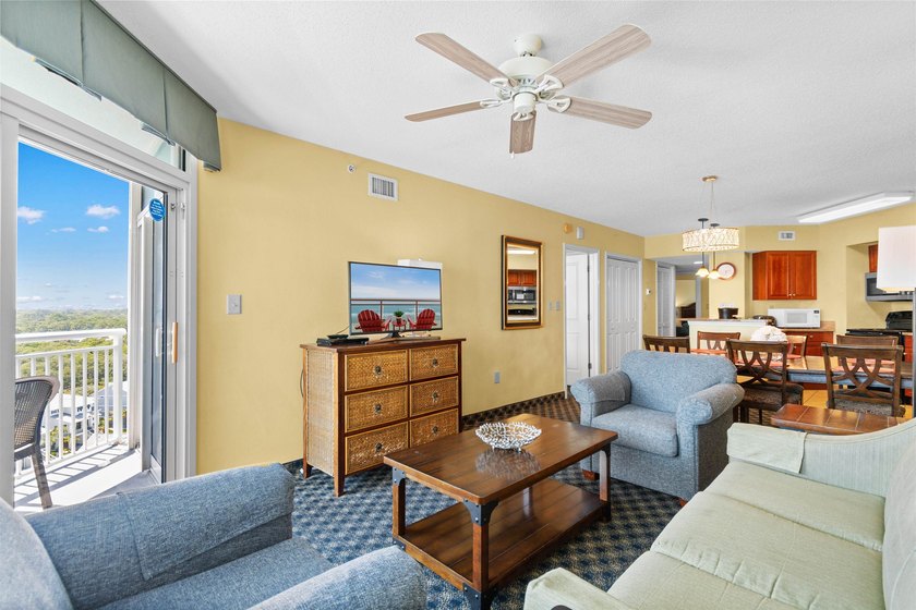 This beautifully furnished three bedroom Penthouse level unit at - photo 13