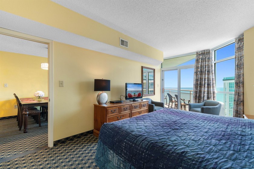 This beautifully furnished three bedroom Penthouse level unit at - photo 14