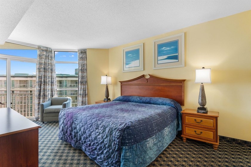 This beautifully furnished three bedroom Penthouse level unit at - photo 15