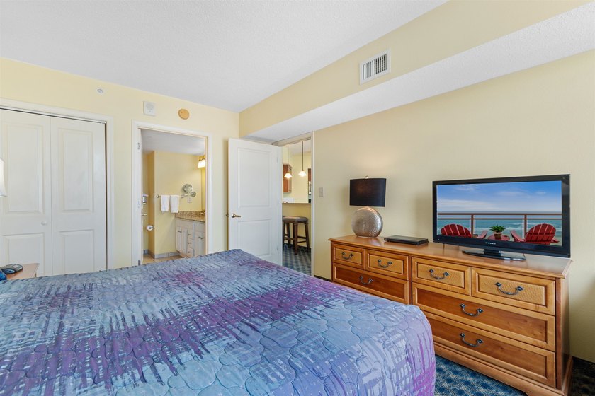 This beautifully furnished three bedroom Penthouse level unit at - photo 16