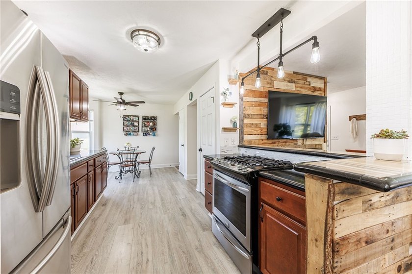 You'll feel right at home in this charming home which offers - photo 18