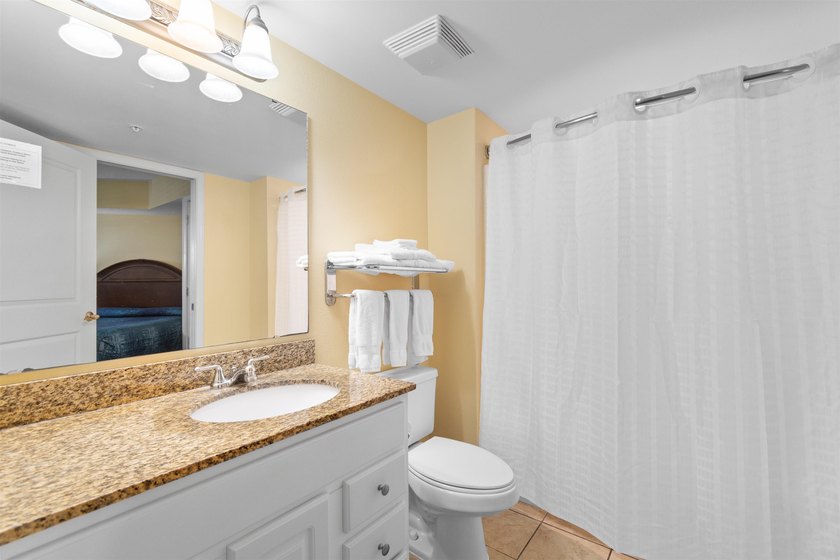 This beautifully furnished three bedroom Penthouse level unit at - photo 21