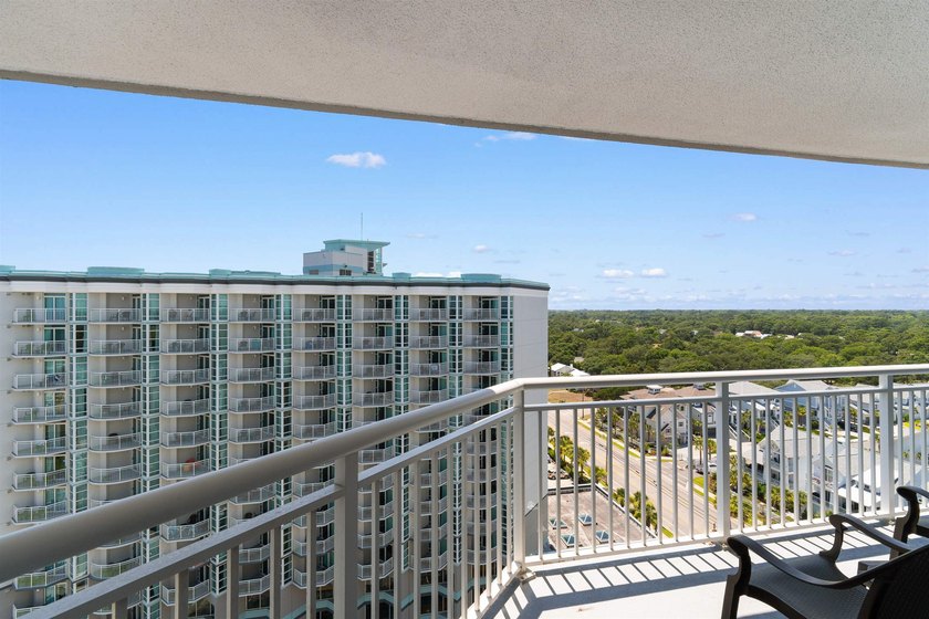 This beautifully furnished three bedroom Penthouse level unit at - photo 26