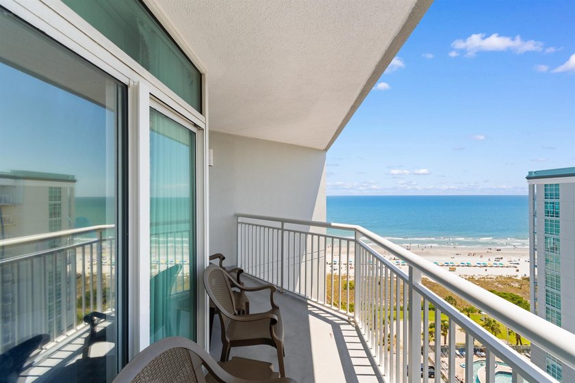 This beautifully furnished three bedroom Penthouse level unit at - photo 27