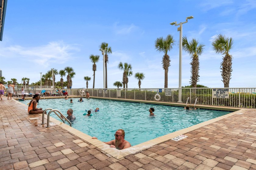 This beautifully furnished three bedroom Penthouse level unit at - photo 49